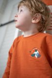 Kids&#039; orange Long-Sleeved T-Shirt &quot;It&#039;s MOEvember time&quot;